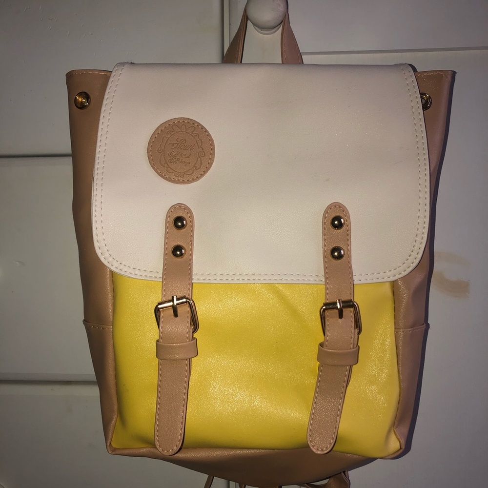 Cream/yellow/tan Backpack